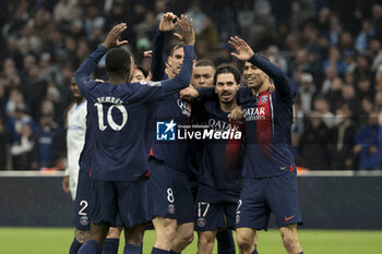 2024-03-31 - Vitinha of PSG #17 celebrates his goal with Fabian Ruiz Pena, Kylian Mbappe, Achraf Hakimi of PSG during the French championship Ligue 1 football match between Olympique de Marseille (OM) and Paris Saint-Germain (PSG) on March 31, 2024 at Stade Velodrome in Marseille, France - FOOTBALL - FRENCH CHAMP - MARSEILLE V PARIS SG - FRENCH LIGUE 1 - SOCCER