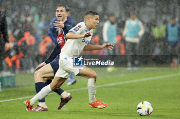 2024-03-31 - Amine Harit of Marseille, left Fabian Ruiz Pena of PSG during the French championship Ligue 1 football match between Olympique de Marseille (OM) and Paris Saint-Germain (PSG) on March 31, 2024 at Stade Velodrome in Marseille, France - FOOTBALL - FRENCH CHAMP - MARSEILLE V PARIS SG - FRENCH LIGUE 1 - SOCCER