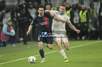 2024-03-31 - Vitinha of PSG, Jordan Veretout of Marseille during the French championship Ligue 1 football match between Olympique de Marseille (OM) and Paris Saint-Germain (PSG) on March 31, 2024 at Stade Velodrome in Marseille, France - FOOTBALL - FRENCH CHAMP - MARSEILLE V PARIS SG - FRENCH LIGUE 1 - SOCCER