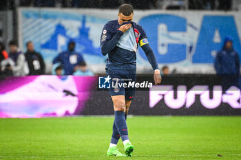2024-03-31 - Kylian MBAPPE of PSG looks dejected during the French championship Ligue 1 football match between Olympique de Marseille and Paris Saint-Germain on March 31, 2024 at Orange Velodrome stadium in Marseille, France - FOOTBALL - FRENCH CHAMP - MARSEILLE V PARIS SG - FRENCH LIGUE 1 - SOCCER