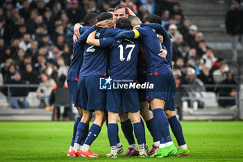 2024-03-31 - Vitor MACHADO FERREIRA (Vitinha) of PSG celebrate his goal with teammates during the French championship Ligue 1 football match between Olympique de Marseille and Paris Saint-Germain on March 31, 2024 at Orange Velodrome stadium in Marseille, France - FOOTBALL - FRENCH CHAMP - MARSEILLE V PARIS SG - FRENCH LIGUE 1 - SOCCER
