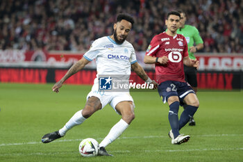 2024-04-05 - Pierre-Emerick Aubameyang of Marseille, Benjamin Andre of Lille during the French championship Ligue 1 football match between Lille OSC (LOSC) and Olympique de Marseille (OM) on April 5, 2024 at Stade Pierre Mauroy in Villeneuve-d'Ascq near Lille, France - FOOTBALL - FRENCH CHAMP - LILLE V MARSEILLE - FRENCH LIGUE 1 - SOCCER