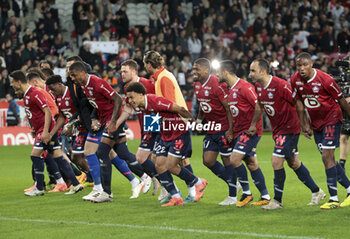 2024-04-05 - Players of Lille celebrate the victory following the French championship Ligue 1 football match between Lille OSC (LOSC) and Olympique de Marseille (OM) on April 5, 2024 at Stade Pierre Mauroy in Villeneuve-d'Ascq near Lille, France - FOOTBALL - FRENCH CHAMP - LILLE V MARSEILLE - FRENCH LIGUE 1 - SOCCER