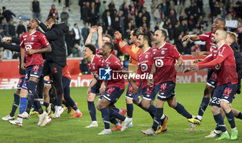 2024-04-05 - Players of Lille celebrate the victory following the French championship Ligue 1 football match between Lille OSC (LOSC) and Olympique de Marseille (OM) on April 5, 2024 at Stade Pierre Mauroy in Villeneuve-d'Ascq near Lille, France - FOOTBALL - FRENCH CHAMP - LILLE V MARSEILLE - FRENCH LIGUE 1 - SOCCER
