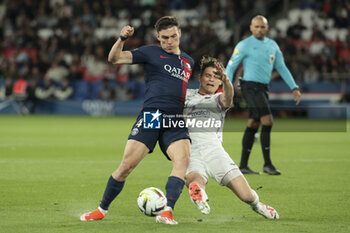 2024-04-06 - Manuel Ugarte of PSG, Yohann Magnin of Clermont during the French championship Ligue 1 football match between Paris Saint-Germain and Clermont Foot 63 on April 6, 2024 at Parc des Princes stadium in Paris, France - FOOTBALL - FRENCH CHAMP - PARIS SG V CLERMONT - FRENCH LIGUE 1 - SOCCER
