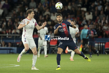 2024-04-06 - Marco Asensio of PSG, left Yohann Magnin of Clermont during the French championship Ligue 1 football match between Paris Saint-Germain and Clermont Foot 63 on April 6, 2024 at Parc des Princes stadium in Paris, France - FOOTBALL - FRENCH CHAMP - PARIS SG V CLERMONT - FRENCH LIGUE 1 - SOCCER