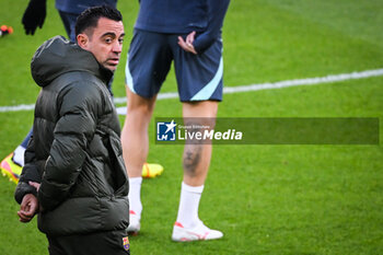 2024-04-09 - Xavier HERNANDEZ CREUS (Xavi) of Barcelona during the FC Barcelona training session ahead of the UEFA Champions League, Quarter-finals, 1st leg football match between Paris Saint Germain and FC Barcelona on April 9, 2024 at Parc des Princes stadium in Paris, France - FOOTBALL - FC BARCELONA TRAINING AND PRESS CONFERENCE - FRENCH LIGUE 1 - SOCCER
