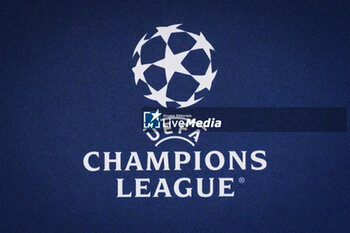 2024-04-09 - Illustration of the official UEFA Champions League logo during the FC Barcelona press conference ahead of the UEFA Champions League, Quarter-finals, 1st leg football match between Paris Saint Germain and FC Barcelona on April 9, 2024 at Parc des Princes stadium in Paris, France - FOOTBALL - FC BARCELONA TRAINING AND PRESS CONFERENCE - FRENCH LIGUE 1 - SOCCER