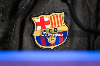 2024-04-09 - Illustration of the official logo of Barcelona during the FC Barcelona press conference ahead of the UEFA Champions League, Quarter-finals, 1st leg football match between Paris Saint Germain and FC Barcelona on April 9, 2024 at Parc des Princes stadium in Paris, France - FOOTBALL - FC BARCELONA TRAINING AND PRESS CONFERENCE - FRENCH LIGUE 1 - SOCCER