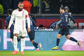 2024-04-21 - Marco ASENSIO of PSG celebrates his goal and Alexandre LACAZETTE of Lyon looks dejected during the French championship Ligue 1 football match between Paris Saint-Germain and Olympique Lyonnais (Lyon) on April 21, 2024 at Parc des Princes stadium in Paris, France - FOOTBALL - FRENCH CHAMP - PARIS SG V LYON - FRENCH LIGUE 1 - SOCCER