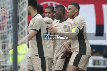 2024-04-24 - Kylian Mbappe of PSG (R) celebrates his goal with teammates during the French championship Ligue 1 football match between FC Lorient and Paris Saint-Germain (PSG) on April 24, 2024 at Stade du Moustoir in Lorient, France - FOOTBALL - FRENCH CHAMP - LORIENT V PARIS SG - FRENCH LIGUE 1 - SOCCER