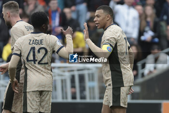 2024-04-24 - Kylian Mbappe of PSG (R) celebrates his goal with Yoram Zague of PSG during the French championship Ligue 1 football match between FC Lorient and Paris Saint-Germain (PSG) on April 24, 2024 at Stade du Moustoir in Lorient, France - FOOTBALL - FRENCH CHAMP - LORIENT V PARIS SG - FRENCH LIGUE 1 - SOCCER