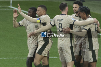 2024-04-24 - Kylian Mbappe of PSG celebrates his second goal with Nuno Mendes and teammates during the French championship Ligue 1 football match between FC Lorient and Paris Saint-Germain (PSG) on April 24, 2024 at Stade du Moustoir in Lorient, France - FOOTBALL - FRENCH CHAMP - LORIENT V PARIS SG - FRENCH LIGUE 1 - SOCCER