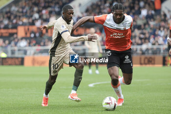 2024-04-24 - Ousmane Dembele of PSG, Isaak Toure of Lorient during the French championship Ligue 1 football match between FC Lorient and Paris Saint-Germain (PSG) on April 24, 2024 at Stade du Moustoir in Lorient, France - FOOTBALL - FRENCH CHAMP - LORIENT V PARIS SG - FRENCH LIGUE 1 - SOCCER