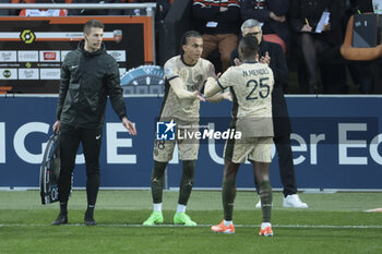 2024-04-24 - Ethan Mbappe of PSG is replacing Nuno Mendes of PSG during the French championship Ligue 1 football match between FC Lorient and Paris Saint-Germain (PSG) on April 24, 2024 at Stade du Moustoir in Lorient, France - FOOTBALL - FRENCH CHAMP - LORIENT V PARIS SG - FRENCH LIGUE 1 - SOCCER