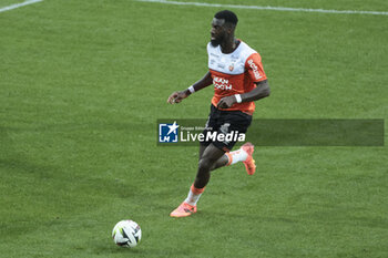 2024-04-24 - Tiemoue Bakayoko of Lorient during the French championship Ligue 1 football match between FC Lorient and Paris Saint-Germain (PSG) on April 24, 2024 at Stade du Moustoir in Lorient, France - FOOTBALL - FRENCH CHAMP - LORIENT V PARIS SG - FRENCH LIGUE 1 - SOCCER