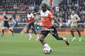 2024-04-24 - Darlin Yongwa of Lorient during the French championship Ligue 1 football match between FC Lorient and Paris Saint-Germain (PSG) on April 24, 2024 at Stade du Moustoir in Lorient, France - FOOTBALL - FRENCH CHAMP - LORIENT V PARIS SG - FRENCH LIGUE 1 - SOCCER