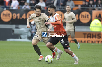 2024-04-24 - Imran Louza of Lorient, left Lee Kang-in of PSG during the French championship Ligue 1 football match between FC Lorient and Paris Saint-Germain (PSG) on April 24, 2024 at Stade du Moustoir in Lorient, France - FOOTBALL - FRENCH CHAMP - LORIENT V PARIS SG - FRENCH LIGUE 1 - SOCCER