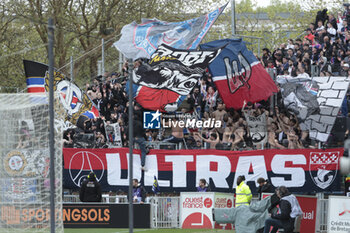 2024-04-24 - Supporters of PSG during the French championship Ligue 1 football match between FC Lorient and Paris Saint-Germain (PSG) on April 24, 2024 at Stade du Moustoir in Lorient, France - FOOTBALL - FRENCH CHAMP - LORIENT V PARIS SG - FRENCH LIGUE 1 - SOCCER
