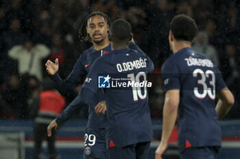 2024-04-27 - Bradley Barcola of PSG celebrates his goal with teammates during the French championship Ligue 1 football match between Paris Saint-Germain (PSG) and Le Havre AC (HAC) on April 27, 2024 at Parc des Princes stadium in Paris, France - FOOTBALL - FRENCH CHAMP - PARIS SG V LE HAVRE - FRENCH LIGUE 1 - SOCCER