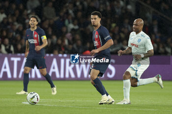 2024-04-27 - Warren Zaire-Emery of PSG, Andre Ayew of Le Havre during the French championship Ligue 1 football match between Paris Saint-Germain (PSG) and Le Havre AC (HAC) on April 27, 2024 at Parc des Princes stadium in Paris, France - FOOTBALL - FRENCH CHAMP - PARIS SG V LE HAVRE - FRENCH LIGUE 1 - SOCCER