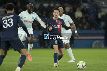 2024-04-27 - Vitinha of PSG, left Abdoulaye Toure of Le Havre during the French championship Ligue 1 football match between Paris Saint-Germain (PSG) and Le Havre AC (HAC) on April 27, 2024 at Parc des Princes stadium in Paris, France - FOOTBALL - FRENCH CHAMP - PARIS SG V LE HAVRE - FRENCH LIGUE 1 - SOCCER