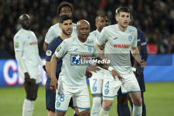 2024-04-27 - Andre Ayew of Le Havre, left Marco Asensio of PSG during the French championship Ligue 1 football match between Paris Saint-Germain (PSG) and Le Havre AC (HAC) on April 27, 2024 at Parc des Princes stadium in Paris, France - FOOTBALL - FRENCH CHAMP - PARIS SG V LE HAVRE - FRENCH LIGUE 1 - SOCCER