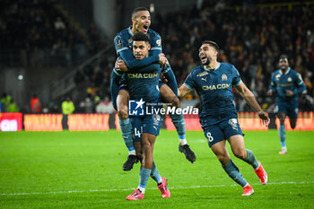 2024-11-23 - Luis HENRIQUE of Marseille celebrate his goal with Pierre-Mason GREENWOOD of Marseille and Neal MAUPAY of Marseille during the French championship Ligue 1 football match between RC Lens and Olympique de Marseille on 23 November 2024 at Bollaert-Delelis stadium in Lens, France - FOOTBALL - FRENCH CHAMP - LENS V MARSEILLE - FRENCH LIGUE 1 - SOCCER