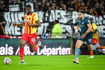 2024-11-23 - Kevin DANSO of Lens and Neal MAUPAY of Marseille during the French championship Ligue 1 football match between RC Lens and Olympique de Marseille on 23 November 2024 at Bollaert-Delelis stadium in Lens, France - FOOTBALL - FRENCH CHAMP - LENS V MARSEILLE - FRENCH LIGUE 1 - SOCCER