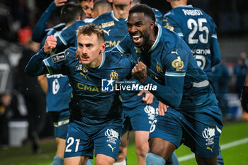 2024-11-23 - Valentin RONGIER of Marseille celebrate his goal with Ulisses GARCIA of Marseille during the French championship Ligue 1 football match between RC Lens and Olympique de Marseille on 23 November 2024 at Bollaert-Delelis stadium in Lens, France - FOOTBALL - FRENCH CHAMP - LENS V MARSEILLE - FRENCH LIGUE 1 - SOCCER