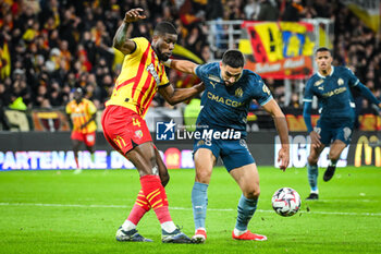 2024-11-23 - Kevin DANSO of Lens and Neal MAUPAY of Marseille during the French championship Ligue 1 football match between RC Lens and Olympique de Marseille on 23 November 2024 at Bollaert-Delelis stadium in Lens, France - FOOTBALL - FRENCH CHAMP - LENS V MARSEILLE - FRENCH LIGUE 1 - SOCCER