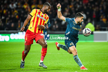 2024-11-23 - Kevin DANSO of Lens and Neal MAUPAY of Marseille during the French championship Ligue 1 football match between RC Lens and Olympique de Marseille on 23 November 2024 at Bollaert-Delelis stadium in Lens, France - FOOTBALL - FRENCH CHAMP - LENS V MARSEILLE - FRENCH LIGUE 1 - SOCCER