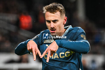 2024-11-23 - Valentin RONGIER of Marseille celebrates his goal during the French championship Ligue 1 football match between RC Lens and Olympique de Marseille on 23 November 2024 at Bollaert-Delelis stadium in Lens, France - FOOTBALL - FRENCH CHAMP - LENS V MARSEILLE - FRENCH LIGUE 1 - SOCCER