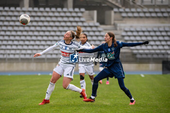 2024-01-14 - Jelena Karlicic of Girondins de Bordeaux and Kessya Bussy of Paris FC fight for the ball during the Women's French cup, round of 32 football match between Paris FC and Girondins de Bordeaux on January 14, 2024 at Sebastien Charlety stadium in Paris, France - FOOTBALL - WOMEN'S FRENCH CUP - PARIS FC V BORDEAUX - FRENCH WOMEN DIVISION 1 - SOCCER