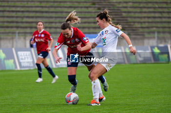 2024-02-14 - Marjorie Boilesen of LOSC Lille and Charlotte Fernandes of FC Fleury 91 fight for the ball during the Women's French Cup, Quarter-final football match between FC Fleury 91 and Losc Lille on February 14, 2024 at Robert Bobin stadium in Bondoufle, France - FOOTBALL - WOMEN'S FRENCH CUP - FLEURY V LILLE - FRENCH WOMEN DIVISION 1 - SOCCER
