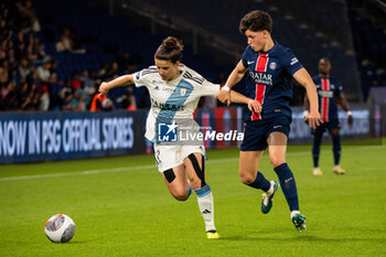 2024-05-11 - Mathilde Bourdieu of Paris FC and Elisa De Almeida of Paris Saint Germain fight for the ball during the Women's French championship, D1 Arkema, Play-offs Semi-final football match between Paris Saint-Germain and Paris FC on May 11, 2024 at Parc des Princes stadium in Paris, France - FOOTBALL - WOMEN'S FRENCH CHAMP - PARIS SG V PARIS FC - FRENCH WOMEN DIVISION 1 - SOCCER