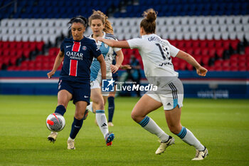 2024-05-11 - Sakina Karchaoui of Paris Saint Germain and Daphne Corboz of Paris FC fight for the ball the Women's French championship, D1 Arkema, Play-offs Semi-final football match between Paris Saint-Germain and Paris FC on May 11, 2024 at Parc des Princes stadium in Paris, France - FOOTBALL - WOMEN'S FRENCH CHAMP - PARIS SG V PARIS FC - FRENCH WOMEN DIVISION 1 - SOCCER