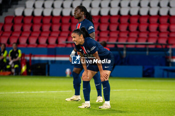 2024-05-11 - Tabitha Chawinga of Paris Saint Germain and Sakina Karchaoui of Paris Saint Germain reacts during the Women's French championship, D1 Arkema, Play-offs Semi-final football match between Paris Saint-Germain and Paris FC on May 11, 2024 at Parc des Princes stadium in Paris, France - FOOTBALL - WOMEN'S FRENCH CHAMP - PARIS SG V PARIS FC - FRENCH WOMEN DIVISION 1 - SOCCER