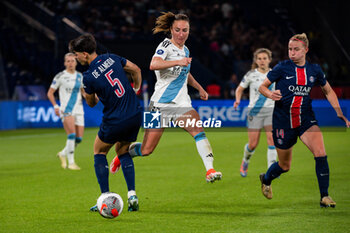 2024-05-11 - Elisa De Almeida of Paris Saint Germain and Gaetane Thiney of Paris FC fight for the ball during the Women's French championship, D1 Arkema, Play-offs Semi-final football match between Paris Saint-Germain and Paris FC on May 11, 2024 at Parc des Princes stadium in Paris, France - FOOTBALL - WOMEN'S FRENCH CHAMP - PARIS SG V PARIS FC - FRENCH WOMEN DIVISION 1 - SOCCER