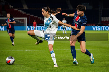 2024-05-11 - Kessya Bussy of Paris FC and Elisa De Almeida of Paris Saint Germain fight for the ball during the Women's French championship, D1 Arkema, Play-offs Semi-final football match between Paris Saint-Germain and Paris FC on May 11, 2024 at Parc des Princes stadium in Paris, France - FOOTBALL - WOMEN'S FRENCH CHAMP - PARIS SG V PARIS FC - FRENCH WOMEN DIVISION 1 - SOCCER