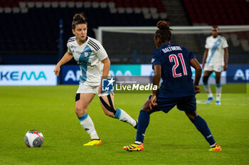 2024-05-11 - Mathilde Bourdieu of Paris FC and Sandy Baltimore of Paris Saint Germain fight for the ball during the Women's French championship, D1 Arkema, Play-offs Semi-final football match between Paris Saint-Germain and Paris FC on May 11, 2024 at Parc des Princes stadium in Paris, France - FOOTBALL - WOMEN'S FRENCH CHAMP - PARIS SG V PARIS FC - FRENCH WOMEN DIVISION 1 - SOCCER