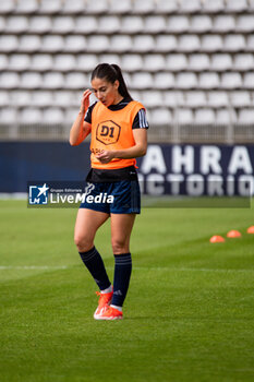 2024-05-17 - Clara Mateo of Paris FC warms up ahead of the Women's French championship, Play-offs, 3rd place football match between Paris FC and Stade de Reims on May 17, 2024 at Sébastien Charléty stadium in Paris, France - FOOTBALL - WOMEN'S FRENCH CHAMP - 3RD PLACE - PARIS FC V REIMS - FRENCH WOMEN DIVISION 1 - SOCCER