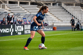 2024-05-17 - Gaetane Thiney of Paris FC controls the ball during the Women's French championship, Play-offs, 3rd place football match between Paris FC and Stade de Reims on May 17, 2024 at Sébastien Charléty stadium in Paris, France - FOOTBALL - WOMEN'S FRENCH CHAMP - 3RD PLACE - PARIS FC V REIMS - FRENCH WOMEN DIVISION 1 - SOCCER