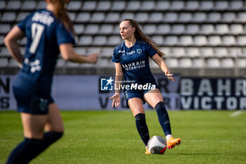 2024-05-17 - Lou Bogaert of Paris FC controls the ball during the Women's French championship, Play-offs, 3rd place football match between Paris FC and Stade de Reims on May 17, 2024 at Sébastien Charléty stadium in Paris, France - FOOTBALL - WOMEN'S FRENCH CHAMP - 3RD PLACE - PARIS FC V REIMS - FRENCH WOMEN DIVISION 1 - SOCCER