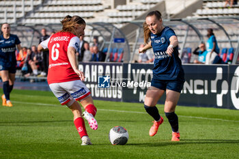 2024-05-17 - Anaele Le Moguedec of Stade de Reims and Julie Dufour of Paris FC fight for the ball during the Women's French championship, Play-offs, 3rd place football match between Paris FC and Stade de Reims on May 17, 2024 at Sébastien Charléty stadium in Paris, France - FOOTBALL - WOMEN'S FRENCH CHAMP - 3RD PLACE - PARIS FC V REIMS - FRENCH WOMEN DIVISION 1 - SOCCER