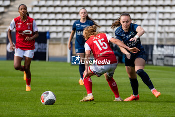 2024-05-17 - Lou Ann Joly of Stade de Reims and Julie Dufour of Paris FC fight for the ball during the Women's French championship, Play-offs, 3rd place football match between Paris FC and Stade de Reims on May 17, 2024 at Sébastien Charléty stadium in Paris, France - FOOTBALL - WOMEN'S FRENCH CHAMP - 3RD PLACE - PARIS FC V REIMS - FRENCH WOMEN DIVISION 1 - SOCCER