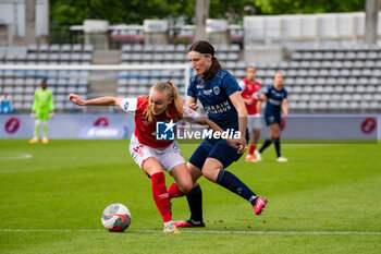 2024-05-17 - Lou Ann Joly of Stade de Reims and Kaja Korosec of Paris FC fight for the ball during the Women's French championship, Play-offs, 3rd place football match between Paris FC and Stade de Reims on May 17, 2024 at Sébastien Charléty stadium in Paris, France - FOOTBALL - WOMEN'S FRENCH CHAMP - 3RD PLACE - PARIS FC V REIMS - FRENCH WOMEN DIVISION 1 - SOCCER