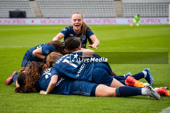 2024-05-17 - Lou Bogaert of Paris FC celebrates the goal with teammates during the Women's French championship, Play-offs, 3rd place football match between Paris FC and Stade de Reims on May 17, 2024 at Sébastien Charléty stadium in Paris, France - FOOTBALL - WOMEN'S FRENCH CHAMP - 3RD PLACE - PARIS FC V REIMS - FRENCH WOMEN DIVISION 1 - SOCCER