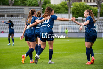 2024-05-17 - Lou Bogaert of Paris FC, Louna Ribadeira of Paris FC and Julie Dufour of Paris FC celebrate the goal during the Women's French championship, Play-offs, 3rd place football match between Paris FC and Stade de Reims on May 17, 2024 at Sébastien Charléty stadium in Paris, France - FOOTBALL - WOMEN'S FRENCH CHAMP - 3RD PLACE - PARIS FC V REIMS - FRENCH WOMEN DIVISION 1 - SOCCER