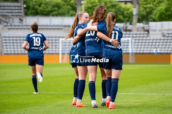 2024-05-17 - Lou Bogaert of Paris FC, Louna Ribadeira of Paris FC and Julie Dufour of Paris FC celebrate the goal during the Women's French championship, Play-offs, 3rd place football match between Paris FC and Stade de Reims on May 17, 2024 at Sébastien Charléty stadium in Paris, France - FOOTBALL - WOMEN'S FRENCH CHAMP - 3RD PLACE - PARIS FC V REIMS - FRENCH WOMEN DIVISION 1 - SOCCER